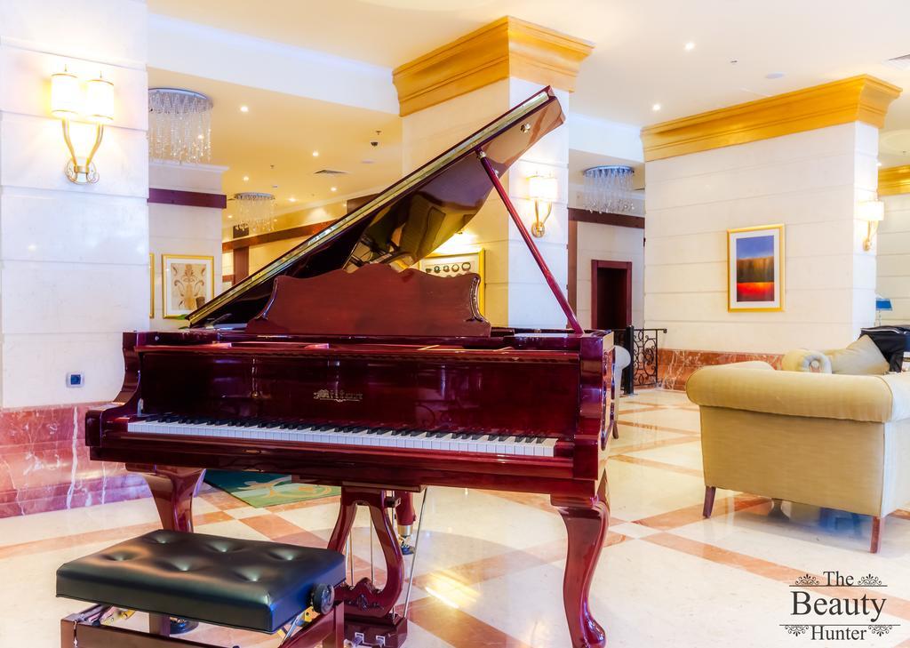 Tolip Hotel Alexandria Exterior photo Piano in the lobby