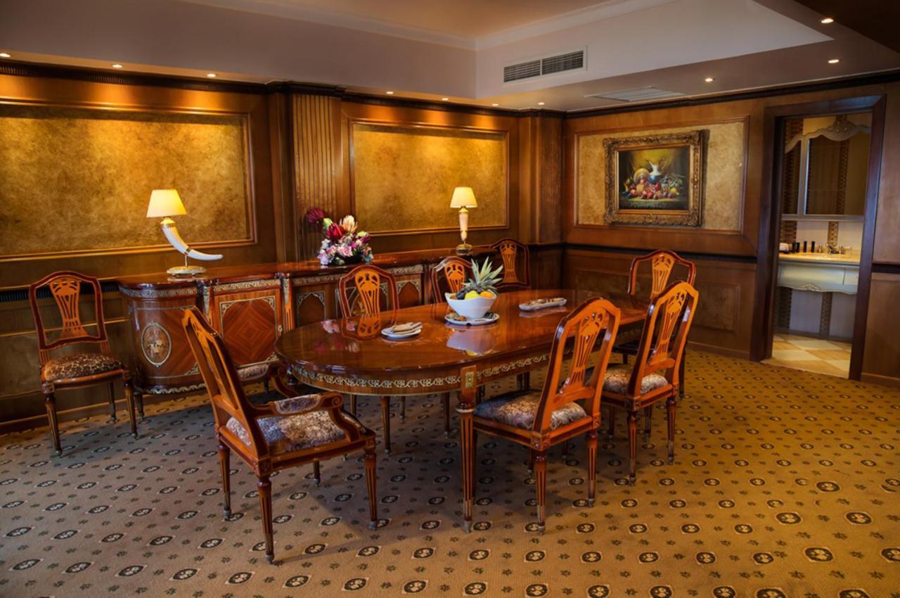 Tolip Hotel Alexandria Exterior photo The dining room of the presidential suite